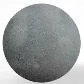 Circular steel disc with mottled gray texture against white background, exhibiting tonal gradient and granular surface detail.